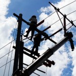 LET THERE BE LIGHT. Workers from the Davao Light Power Company repairs power lines along Obrero Street in Davao City. (davaotoday.com photo by Medel V. Hernani)