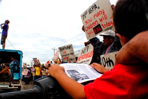 JUSTICE FOR ROQUE. Children and rights advocates join the funeral march Wednesday for eight-year-old Roque Antivo who was allegedly killed in a strafing incident by members of the 71st IB. Mourners stopped outside the Mabini Police Station as they demand for justice for Roque and all other children who were victims of the military including Sunshine Jabinez and Grecil Buya. (davaotoday.com photo by John Rizle L. Saligumba)
