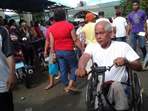 PWD. An elder person with disability was among the early birds in the polling center in Cesario Villa-Abrille Elementary School in Bucana (Brgy. 76-A). (davaotoday.com photo by Tyrone A. Velez)
