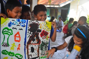 Children painting the effects of the siege during their psycho-social counseling. (davaotoday.com photo by Ace R. Morandante)