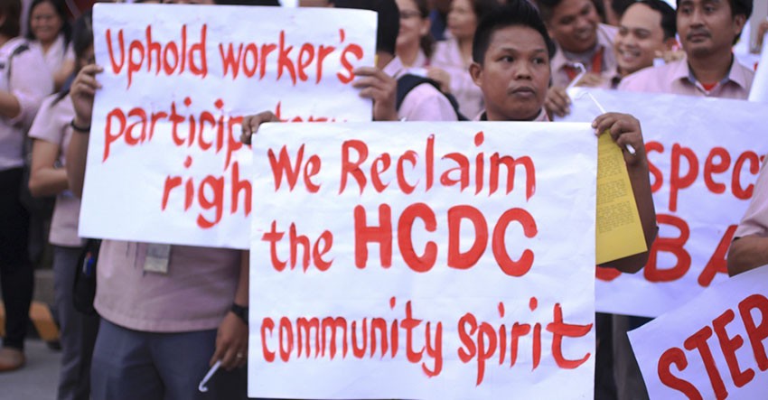 Holy Cross of Davao employees protest new guidelines in grievance procedure