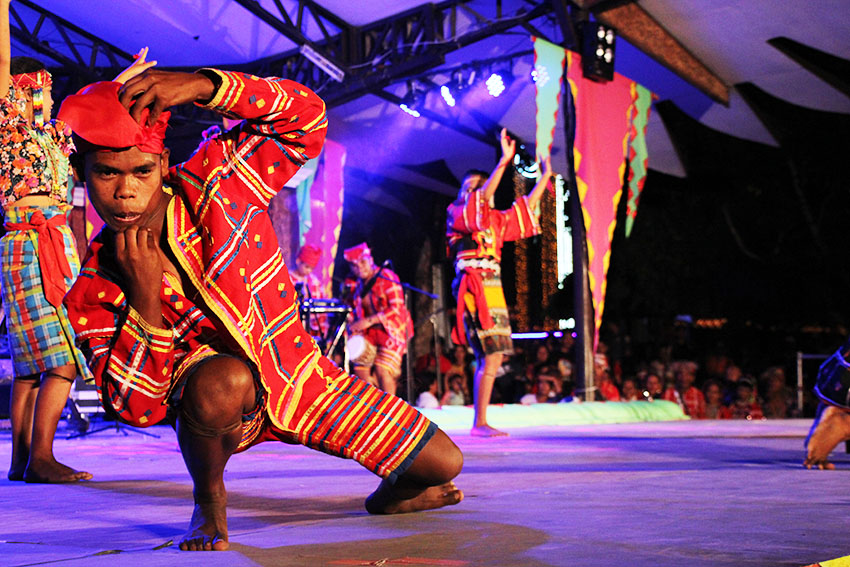 DAILY LIFE. In one of this year's Kadayawan sa Dabaw highlight, members of the Ata tribe perform a cultural dance that resemble​s​ their commitment to passing on their culture to the youth during the opening of the "Tribuhanong Pasundayag" (Tribal presentation) on Wednesday evening, August 16 at the Rizal Park in Davao City. (Paulo C. Rizal/davaotoday.com)