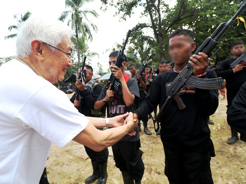 PEACE ADVISER MEETS GUERRILLA FIGHTERS