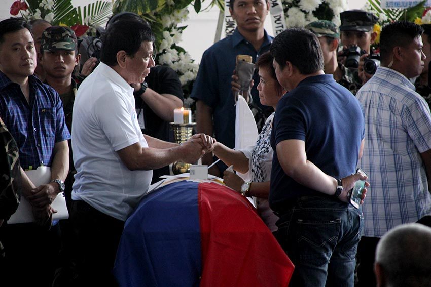 LOOK: President Rodrigo Duterte visits the wake of slain soldiers in Davao City