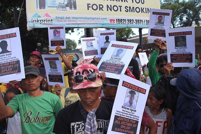 Families of farmer activists killed in Davao region appeal for Duterte’s help