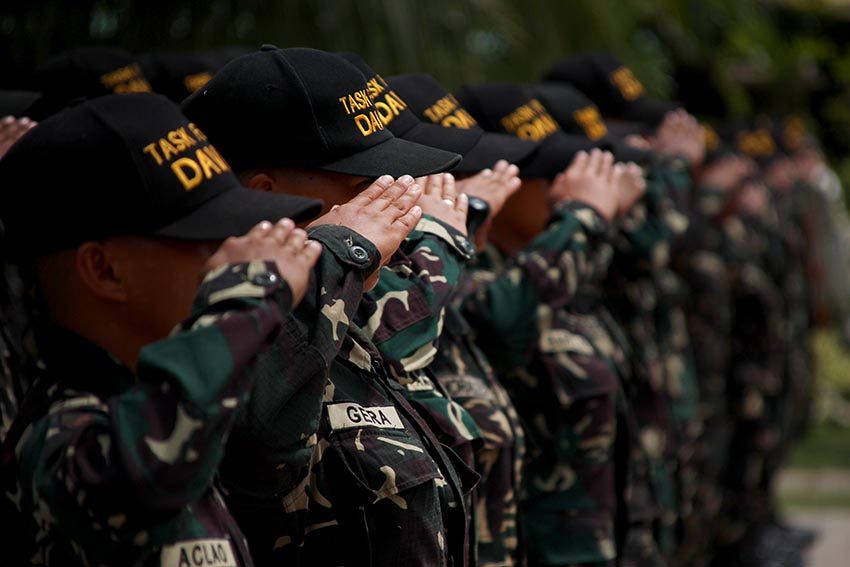 Regulate troops uniform use, councilor urges