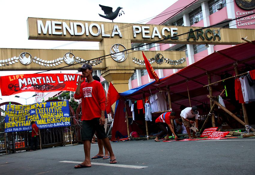 IN PHOTOS|  Davao workers join protest in Mendiola ahead of SONA