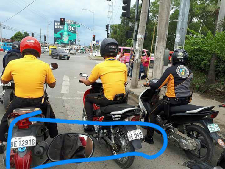 Traffic enforcers caught using duplicated plates in viral photo lose jobs