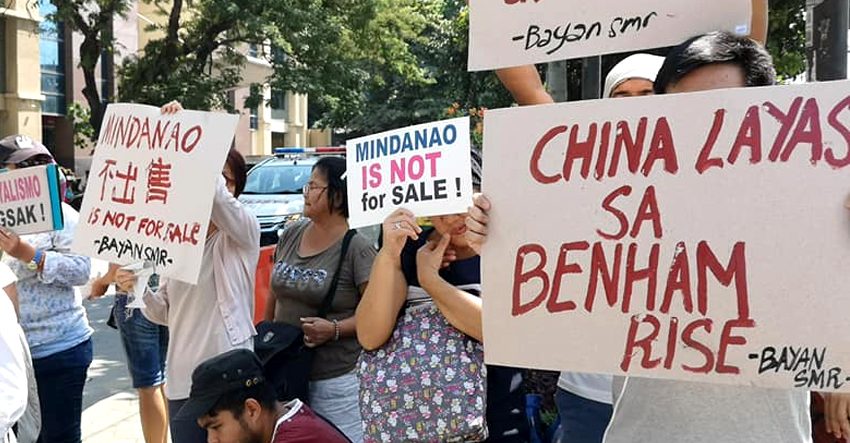 Militants hit Duterte’s subservience to China as 29 ‘lopsided’ agreements signed