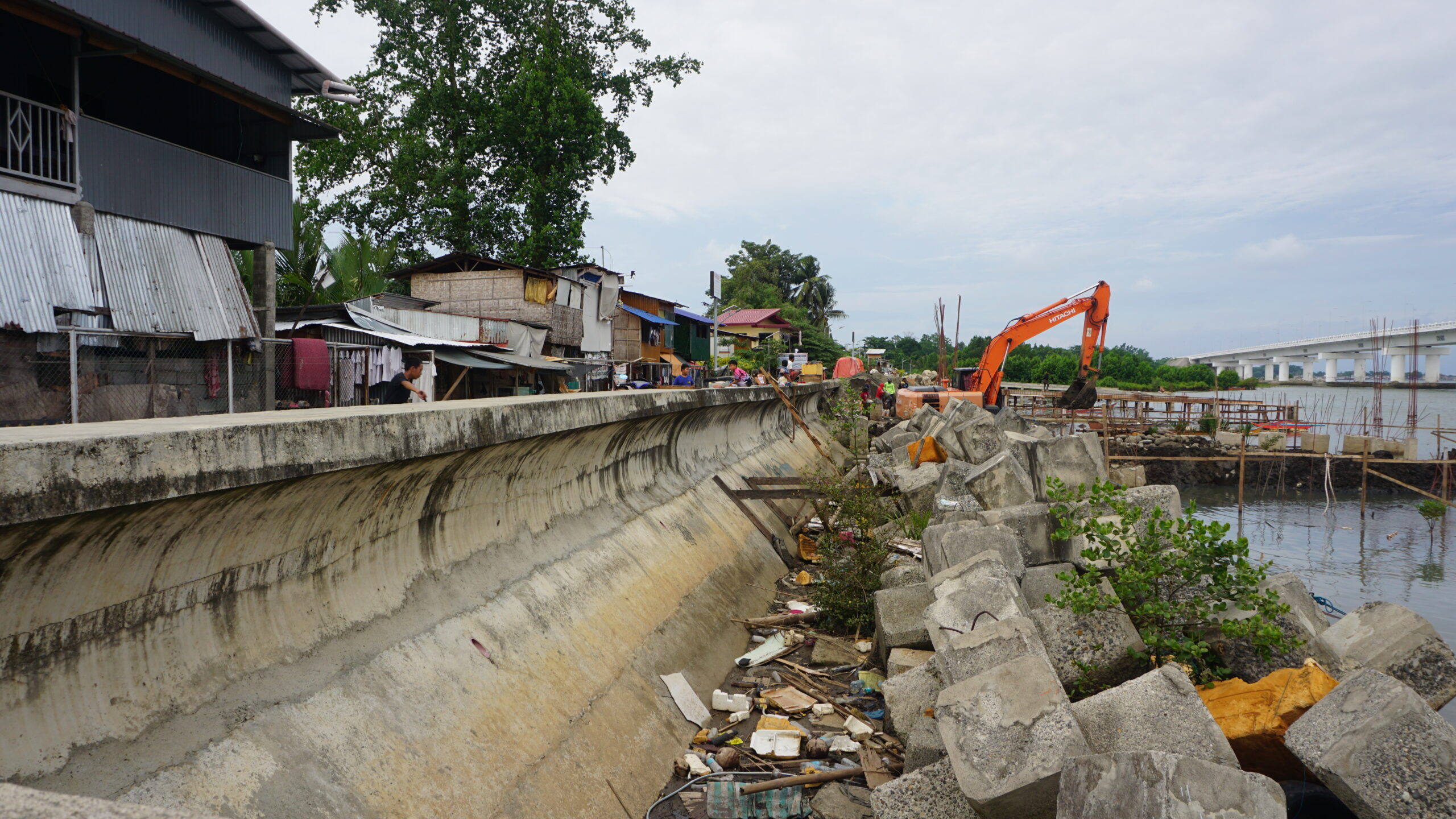 You are currently viewing Tides of change ripple through riverside homes along NHA Bangkal dike